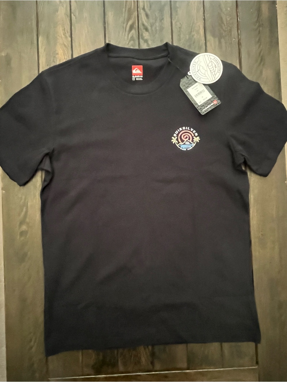 Quiksilver Black Short Sleeve Tee with Small Multicolor Chest Logo